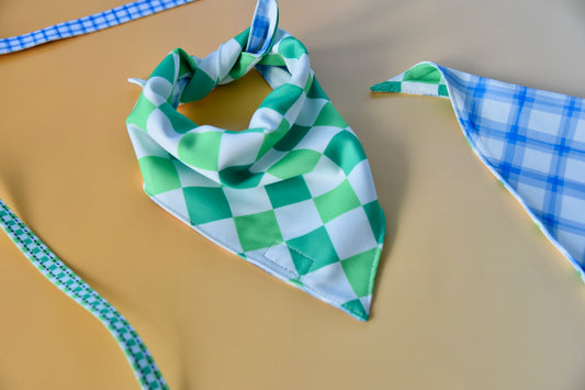 Green and white checkered bandana on a beige surface